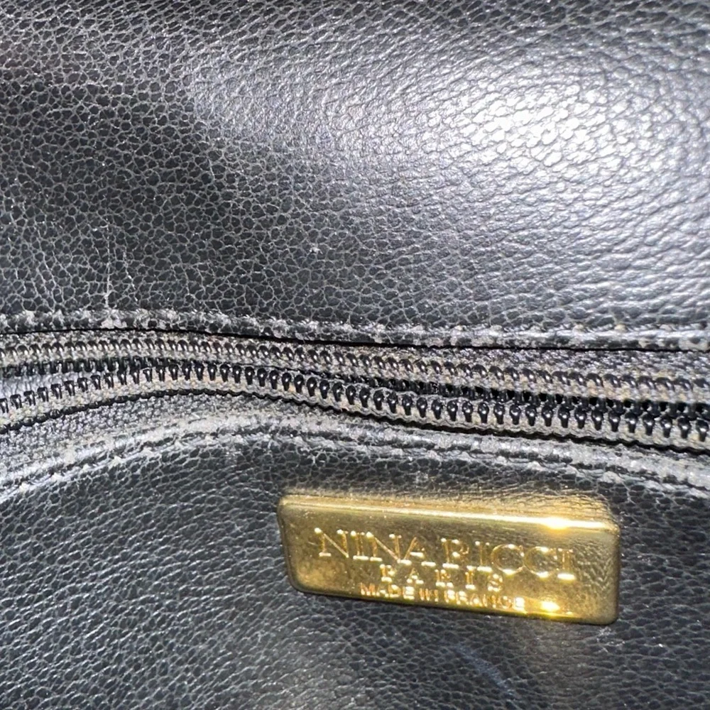 Nina Ricci Black Shoulder Bag with Structured Design and Gold Hardware